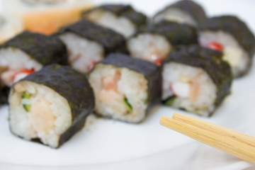 Japanese cuisine, rice sushi and fish - closeup
