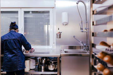 woman working on bakery preparing sweets