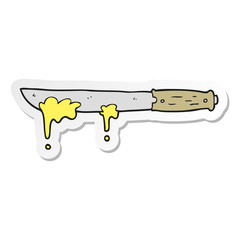 sticker of a cartoon butter knife