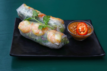 Spring rolls with shrimps and dipping chili sauce
