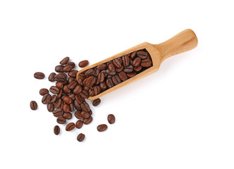 Wooden scoop of roasted coffee beans on white