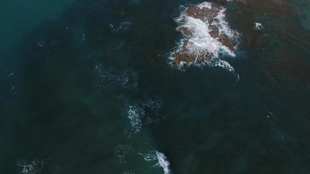 Drone above sea with rocks Slow-motion Full HD