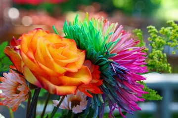 Nice and beautiful bouquet of colourful flowers outside during the day.