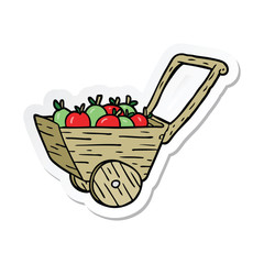 sticker of a cartoon apple cart