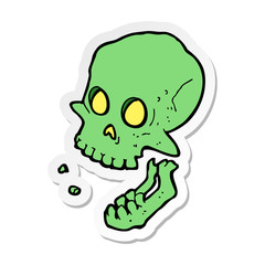 sticker of a cartoon laughing skull