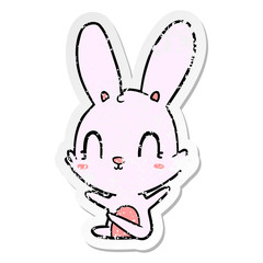 distressed sticker of a cute cartoon rabbit