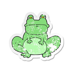 retro distressed sticker of a cartoon frog
