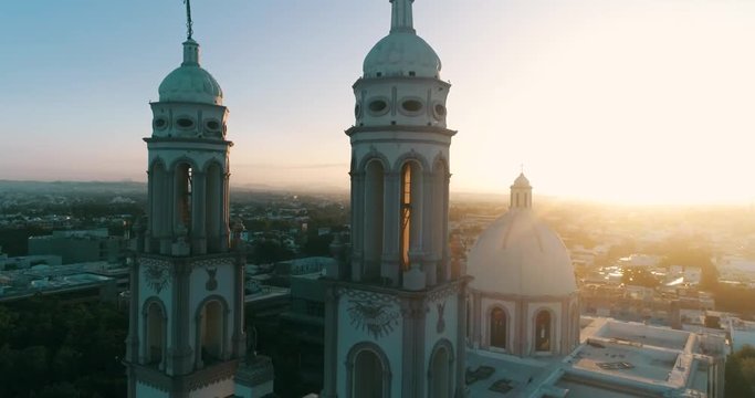 Aerial shot in the sunrise of the Antigua Cathedral Basilica de Nuestra Sanora del Rosario in the city center of Culiacan Sinaloa.