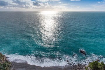 waves crashing on rocks