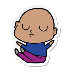 sticker of a cartoon bald man