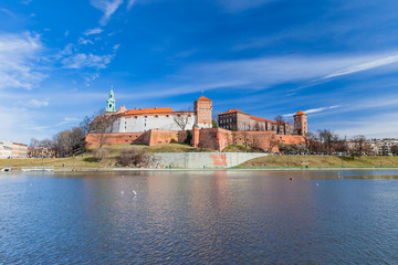  The Wawel Castle on blue sky background. Castle residency located in central Krakow, Poland. February 23, 2019.