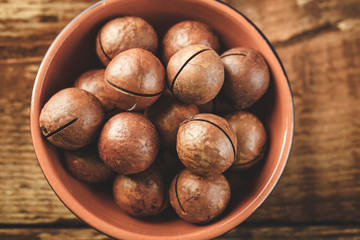 Macadamia nuts on wooden table