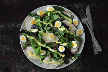 Healthy fitness salad with quail eggs and chicken breast. Keto diet. Paleo diet. Pegan diet.