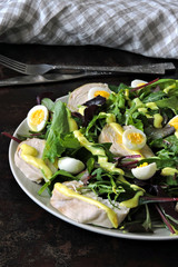 Healthy fitness salad with quail eggs and chicken breast. Keto diet. Paleo diet. Pegan diet.