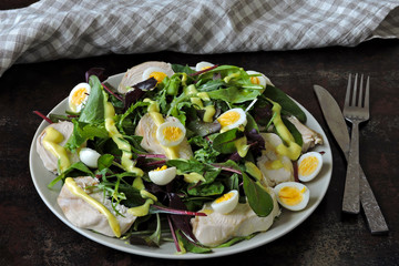 Healthy fitness salad with quail eggs and chicken breast. Keto diet. Paleo diet. Pegan diet.