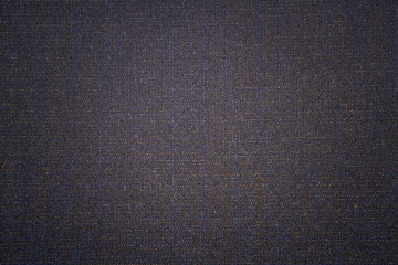Dark blue  fabric texture background. Dark woven clothing material.