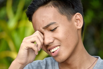 Fototapeta premium An Asian Male Crying