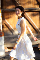 Naklejka premium beautiful middle-aged woman at summer day