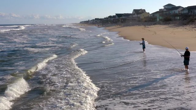 071 Aerial view of town, ocean and beach. 4k