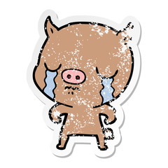 distressed sticker of a cartoon pig crying