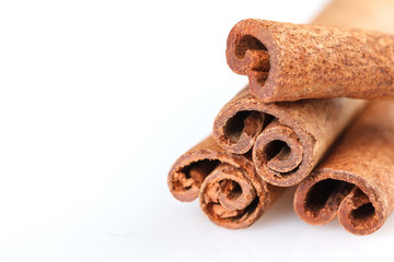Fragrant cinnamon sticks isolated on white background.