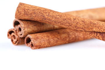Fragrant cinnamon sticks isolated on white background.
