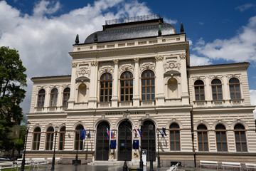 Fototapeta na wymiar Renovated facade of the National Gallery of Slovenia after a rain storm in Ljubljana Slovenia built in 1896 by architect Skabrout