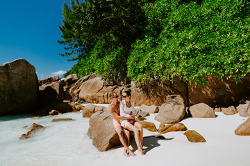 couple travel on beach of tropical island