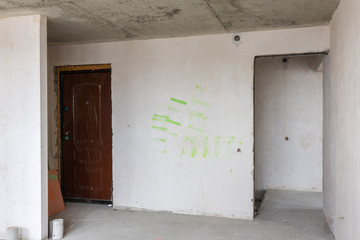 The entrance to the apartment in the new building, layout