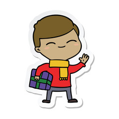 sticker of a cartoon smiling boy with gift