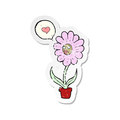 retro distressed sticker of a cartoon flower
