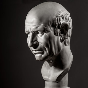 white gypsum statue of Cicero's head on black background - photo image