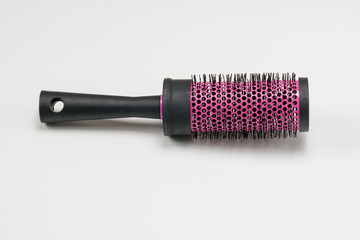 Hair styling comb on white background. Studio shot.