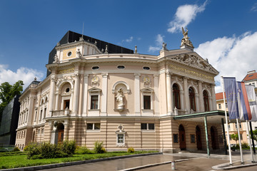 Fototapeta na wymiar Neo Renaissance architecture of the Slovenian National Opera and Ballet Theatre of Ljubljana Slovenia in sun after a rain storm