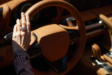 Woman driving car, Hand hold steering wheel, close-up