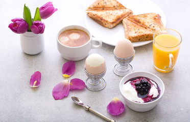 Delicious breakfast on a gray background.