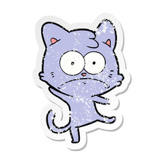 distressed sticker of a cartoon nervous cat