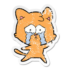 distressed sticker of a cartoon crying cat