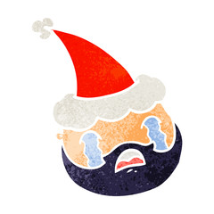 retro cartoon of a male face with beard wearing santa hat