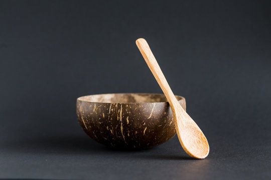 Coconut shell bowl , bowl made from coconut shell, black background