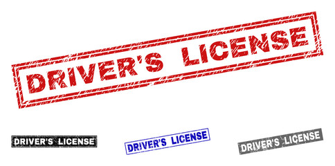 Grunge DRIVER'S LICENSE rectangle stamp seals isolated on a white background. Rectangular seals with grunge texture in red, blue, black and grey colors.