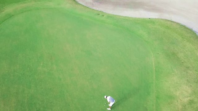 A couple of golfers making some bad putts.