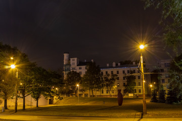 Riga city the capital of Latvia at night at the left bank of Daugava river.