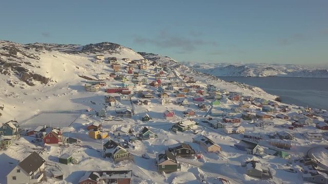 Snow town, colorful village in Covered with snow  time aerial view , qaqortoq south greenland europe
