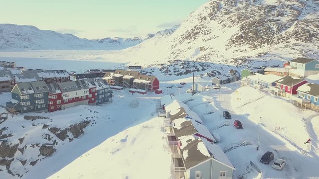 Snow town, colorful village in Covered with snow time aerial view , qaqortoq south greenland europe
