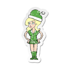 retro distressed sticker of a cartoon santas helper