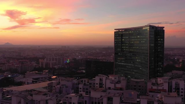 sunset sky flight over bangalore city famous wtc building block aerial panorama 4k india