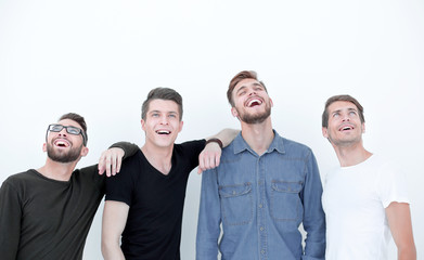 portrait of many men smiling and looking upwards