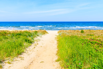 Path to beach among sand dunes in Baabe coastal village, Baltic Sea, Germany