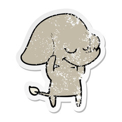 distressed sticker of a cartoon smiling elephant